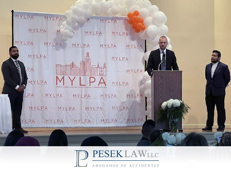 Ross Pesek is awarded the Latino Ally of the Year recognition by MYLPA